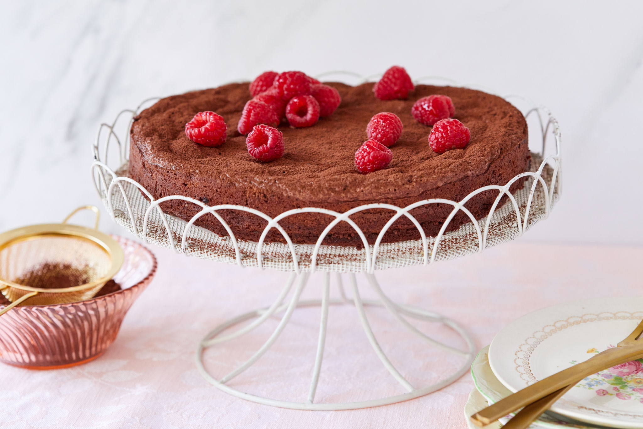 Flourless Chocolate Almond Torte topped with raspberries